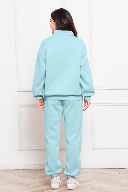 Half Zip Long Sleeve Sweatshirt and Pants Set.