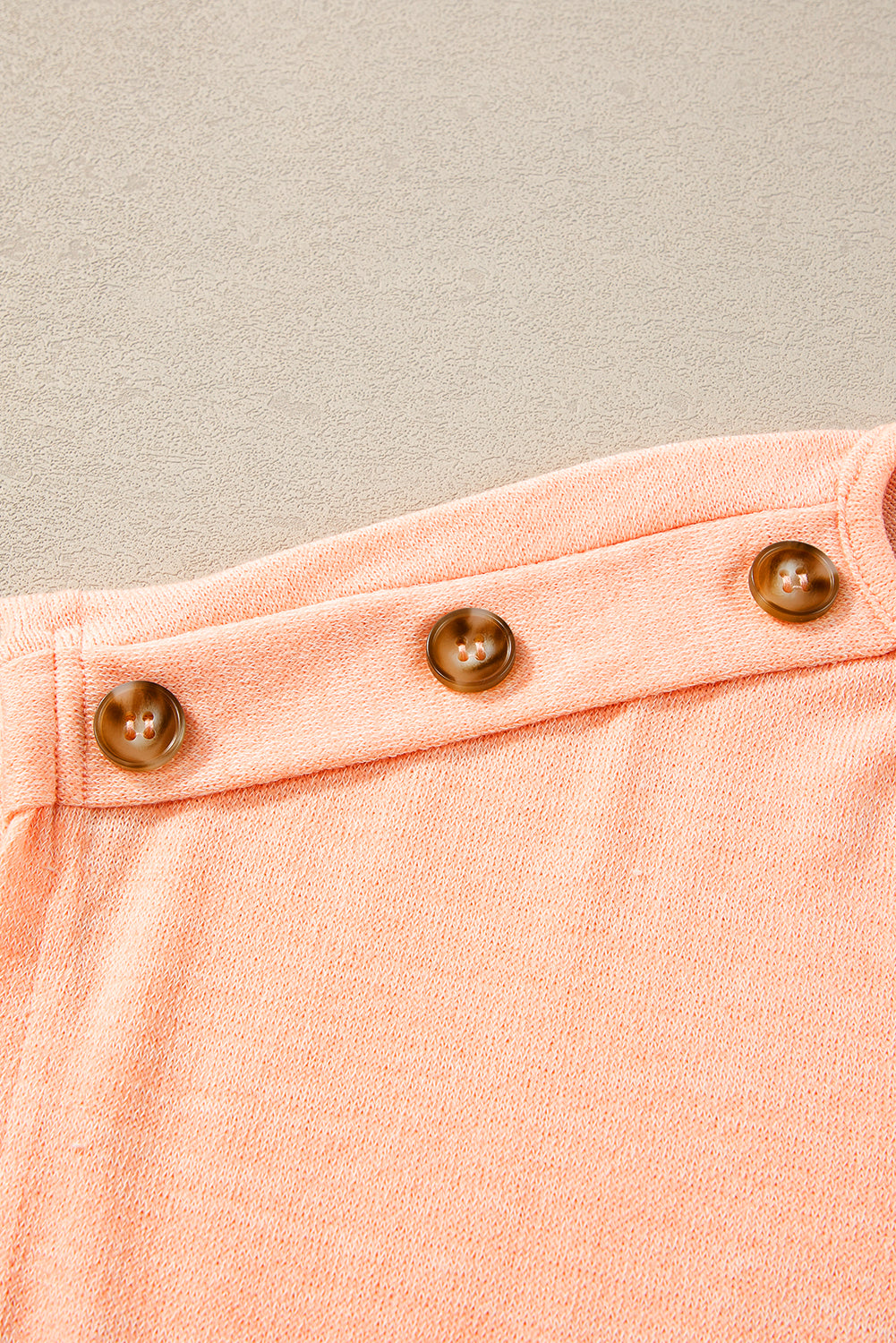 Chic apricot pink batwing sleeve tee with button accents