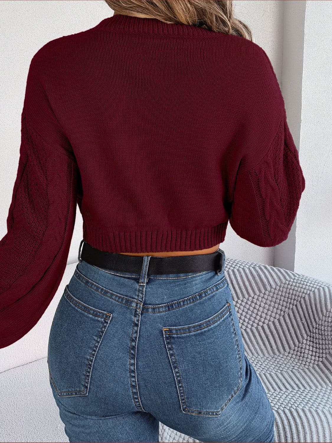 Cable-Knit Round Neck Cropped Sweater.