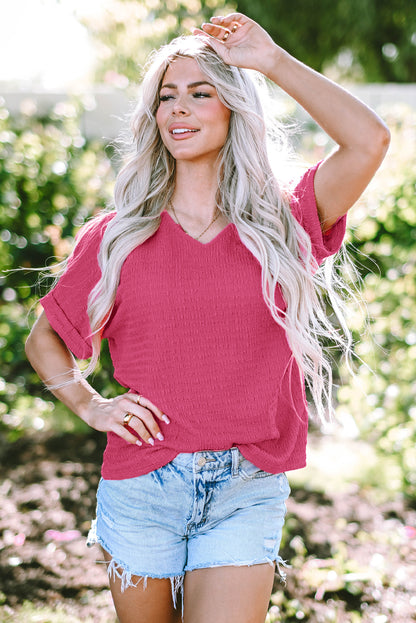 Chic bright pink rolled sleeve V neck tee for effortless style