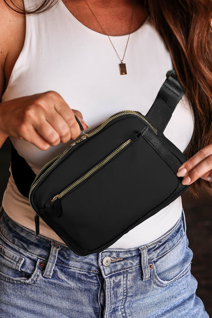 Sleek black crossbody bag with multiple zip compartments