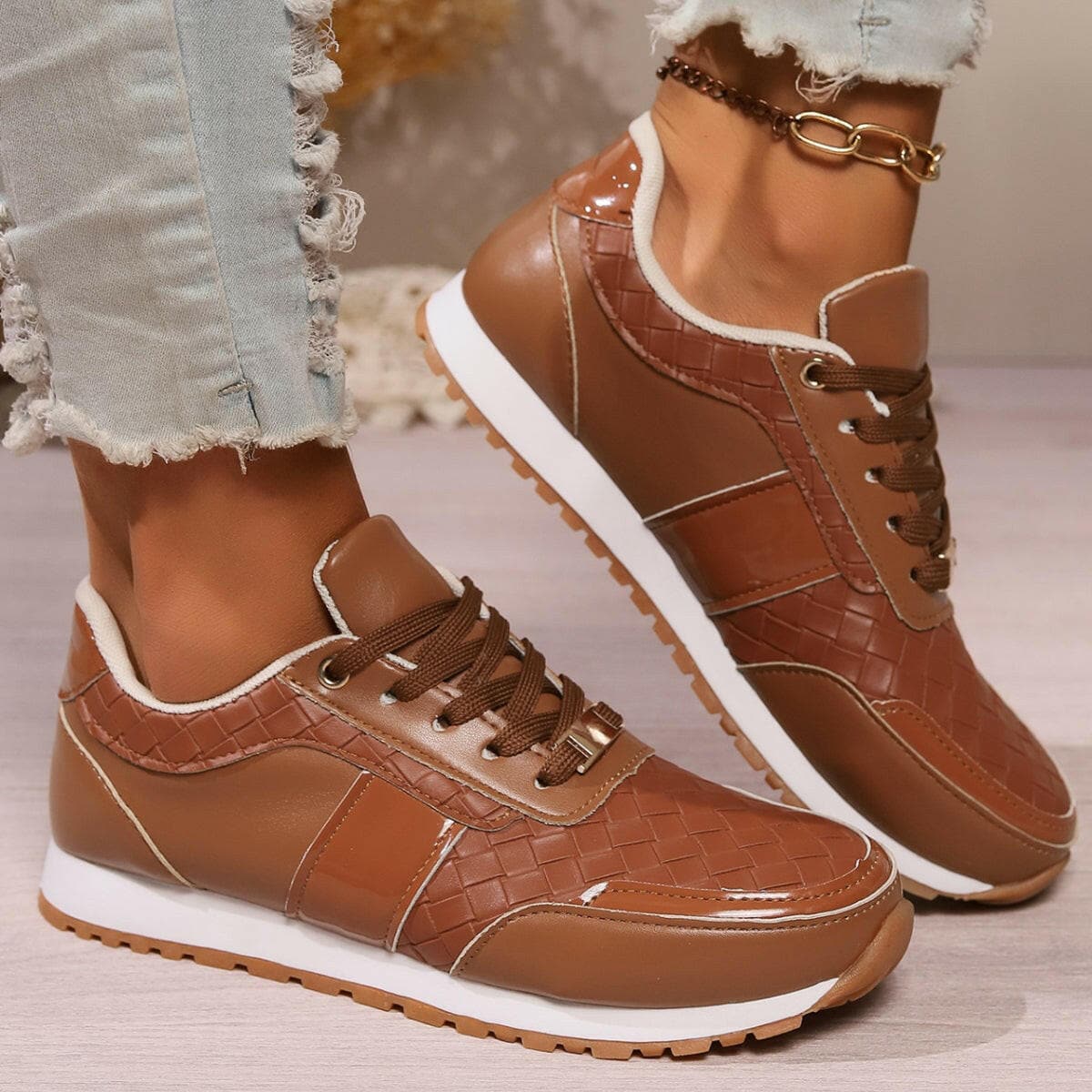 Lace-Up PU Leather SneakersLace-Up PU Leather Sneakers
 Step up your style game with our Lace-Up PU Leather Sneakers. Elevate your footwear collection with these sleek and comfortable sneakersLove Salve PU Leather SneakersShoes