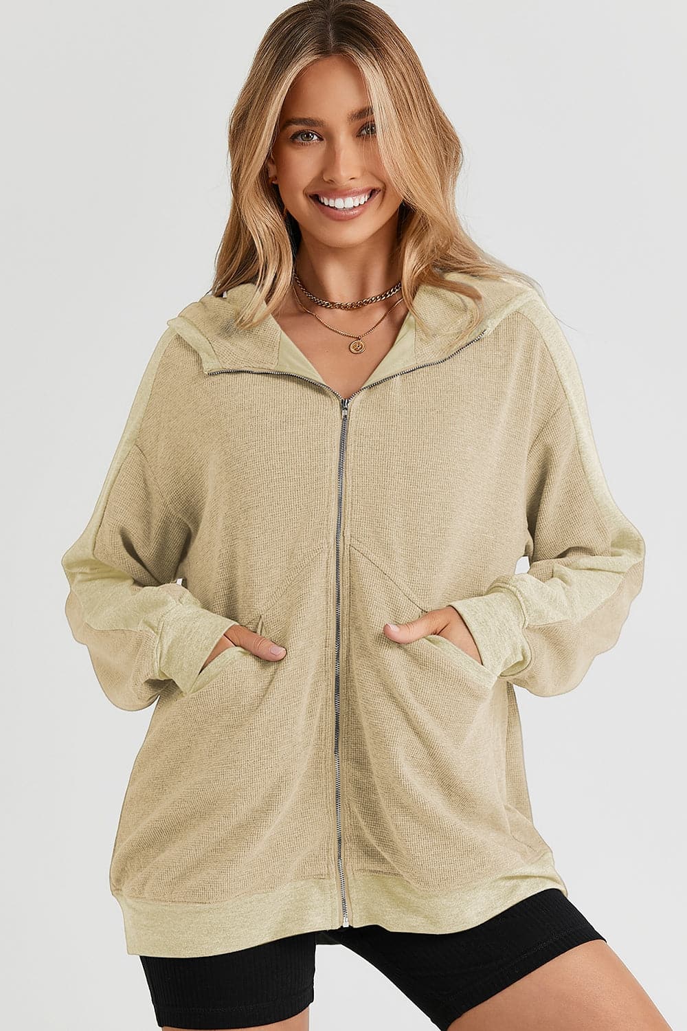 Pocketed Zip Up Dropped Shoulder Hooded Jacket.