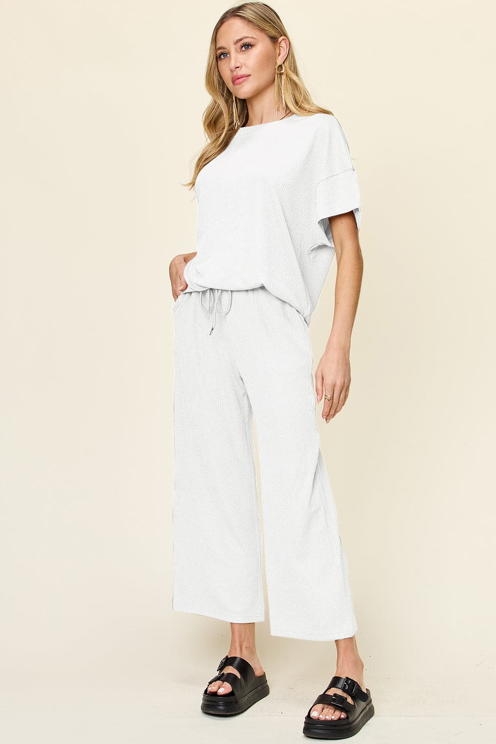 Double Take Full Size Texture Round Neck Short Sleeve T-Shirt and Wide Leg Pants.