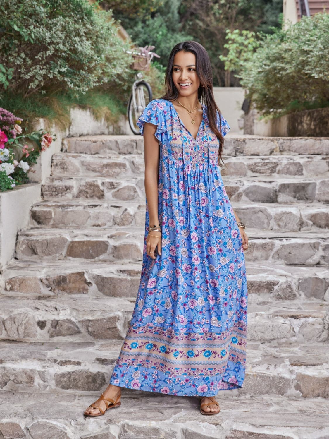 Ruffled Printed Tie Neck Cap Sleeve Dress.