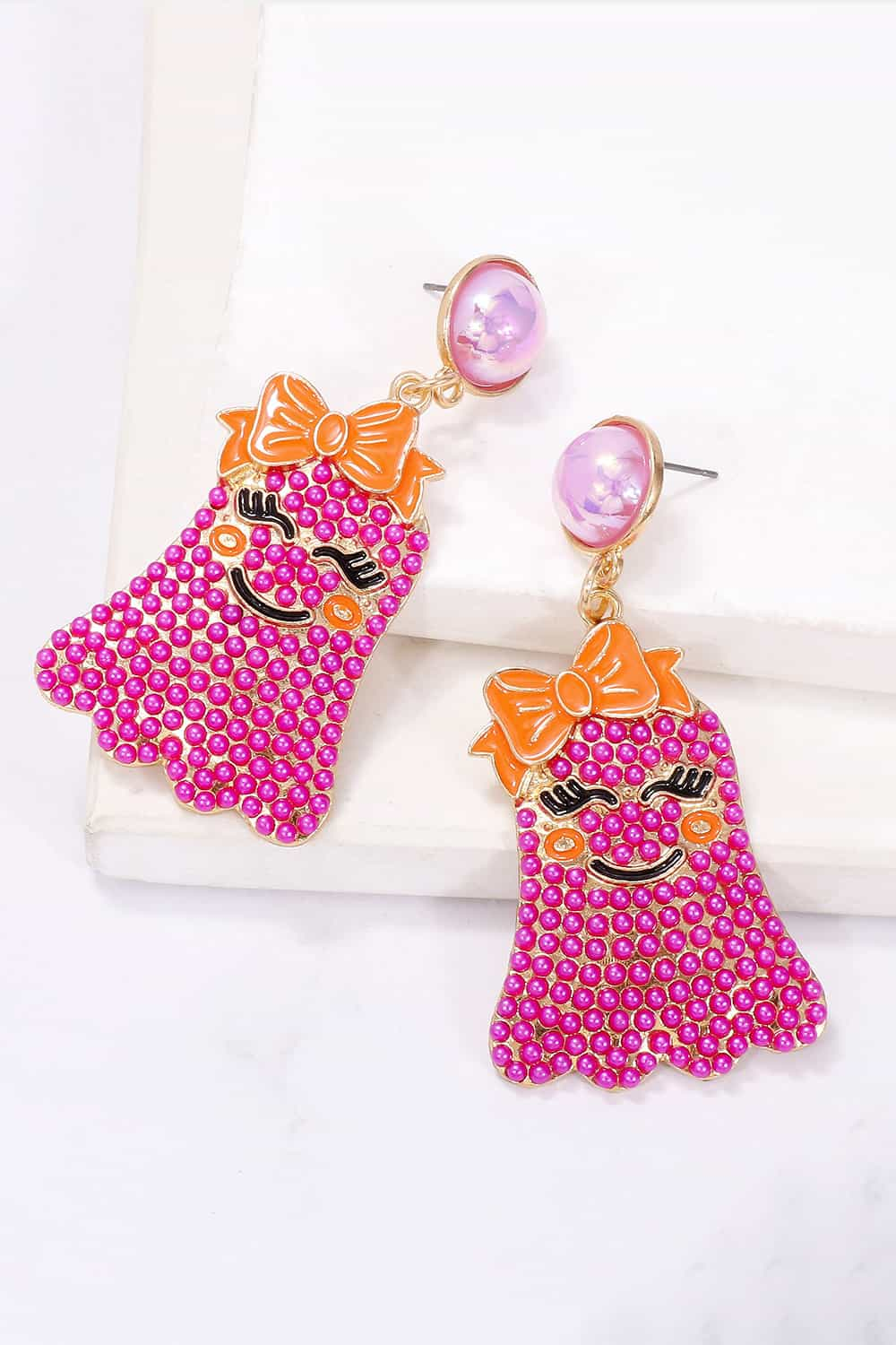 Charming ghost earrings with pearls