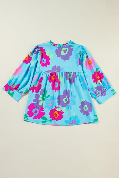 Plus Size Peplum Printed Notched Blouse.