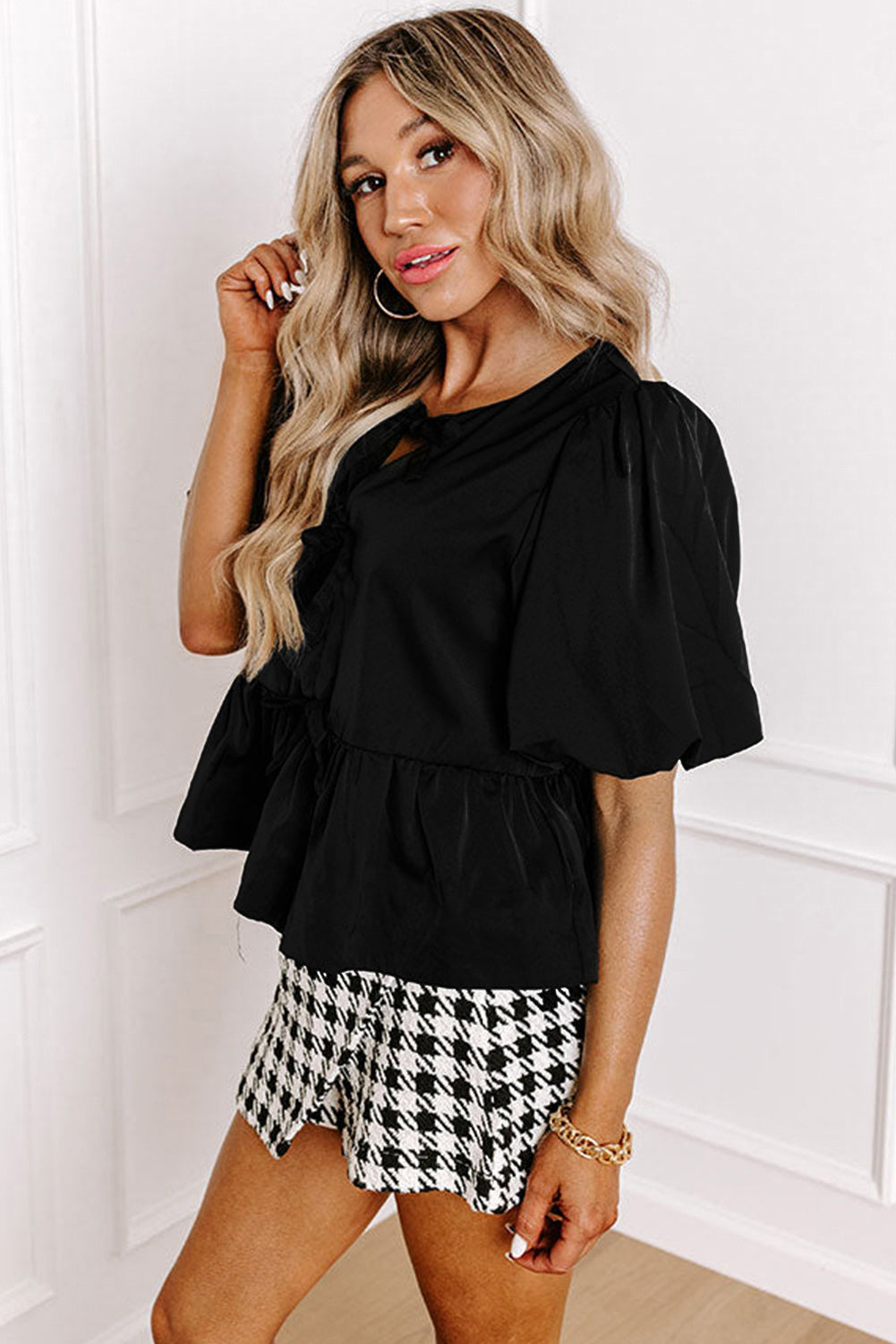 Chic Black Peplum Blouse with Puff Sleeves and Bowknot Detail