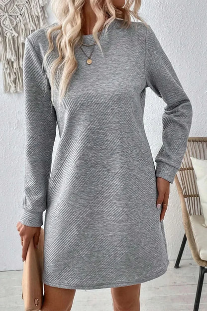 Textured long sleeve mini dress with round neck