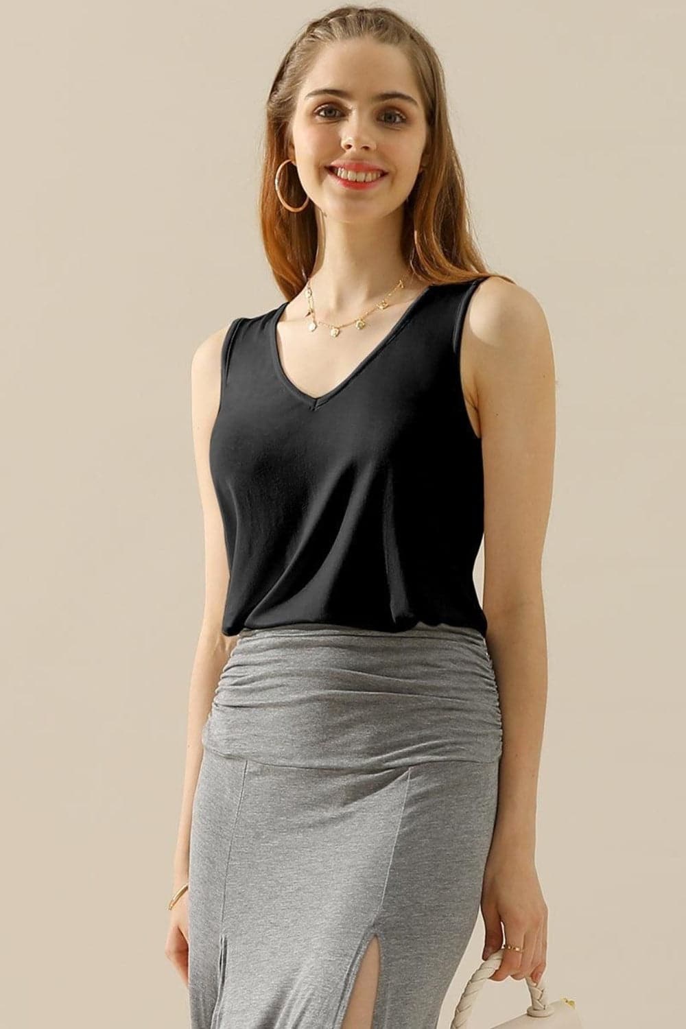 Ninexis Full Size V-Neck Curved Hem Tank.