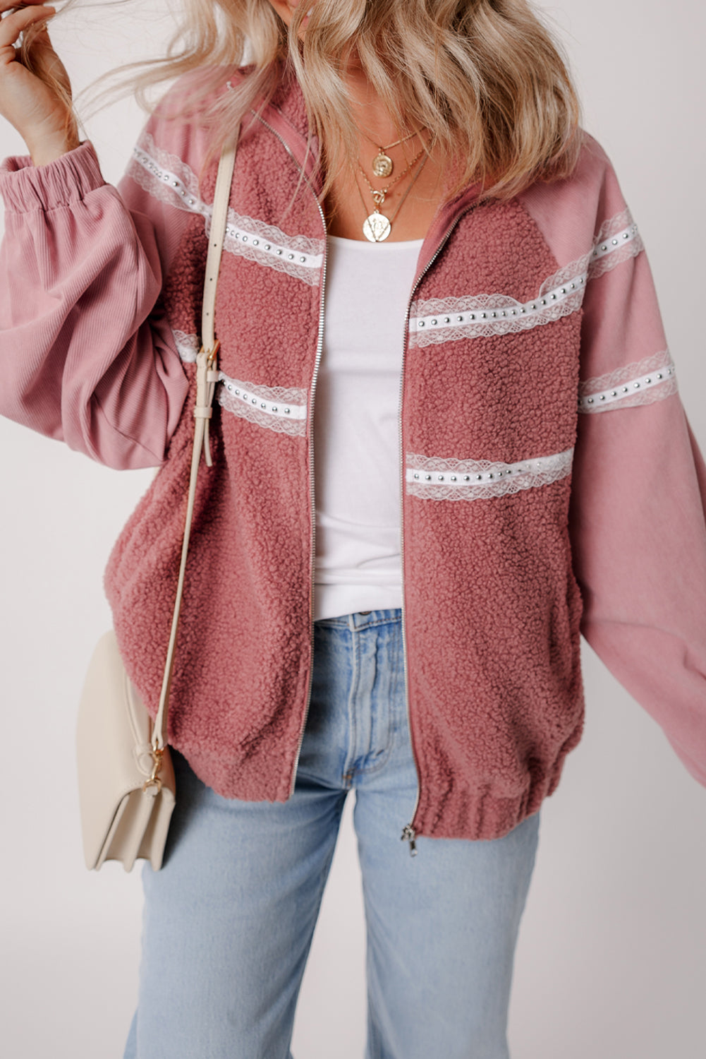 Cozy rose pink sherpa jacket with lace detailing and zip-up style