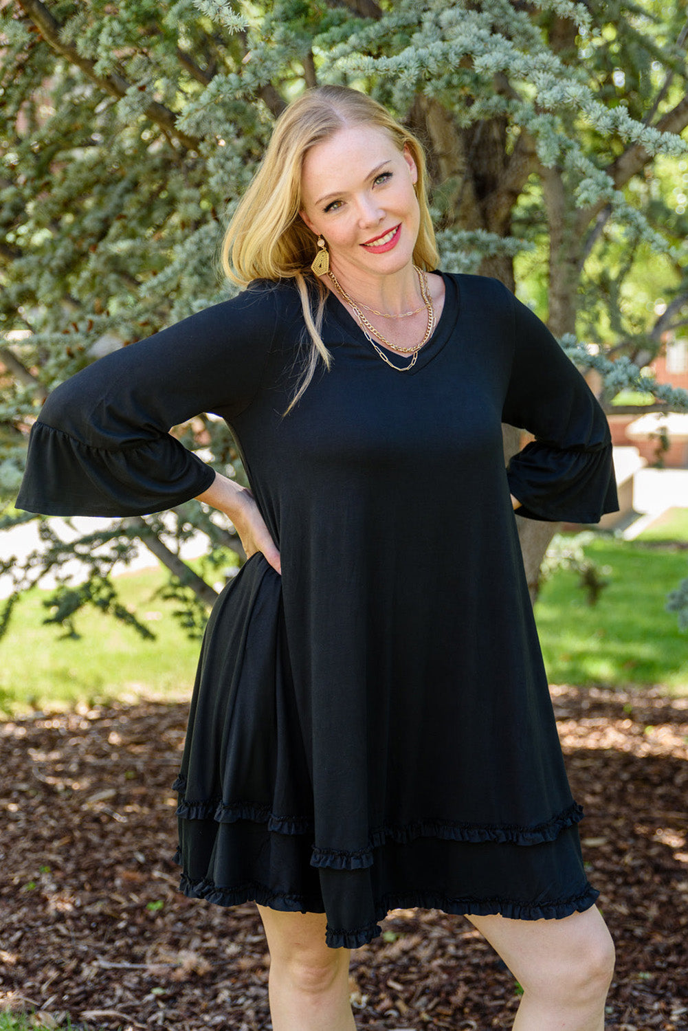 Chic black plus size ruffled sleeve dress for effortless elegance