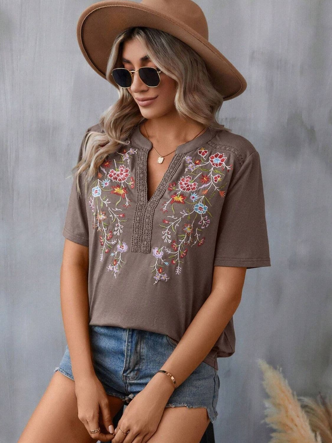 Embroidered Notched Short Sleeve T-Shirt.