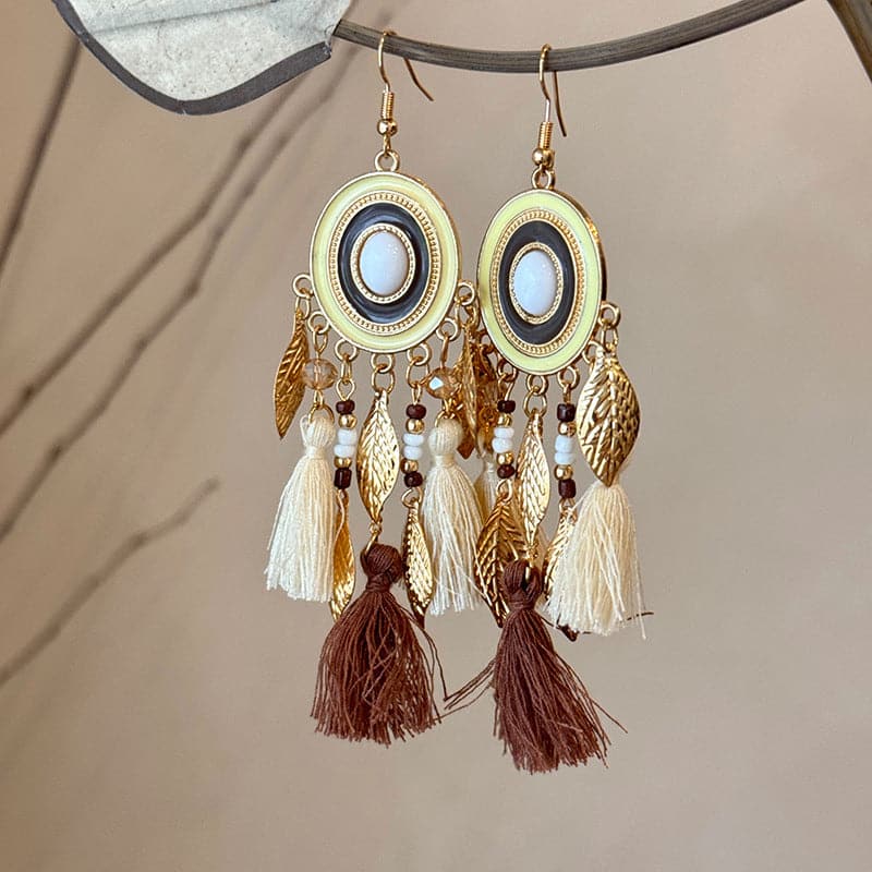 Feather and rice bead alloy earrings