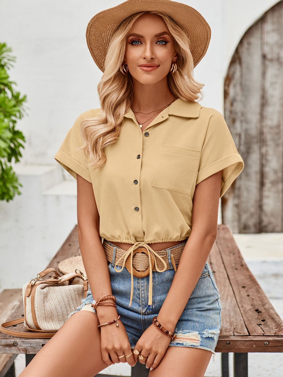 Drawstring Pocketed Collared Neck Short Sleeve Shirt.