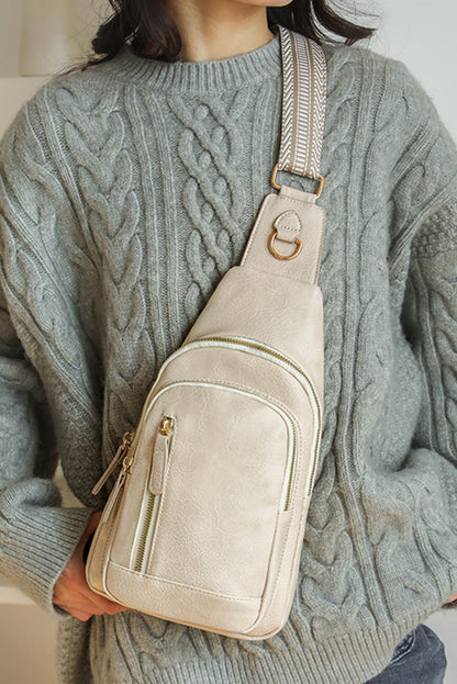 Chic beige vintage crossbody bag with zip closure