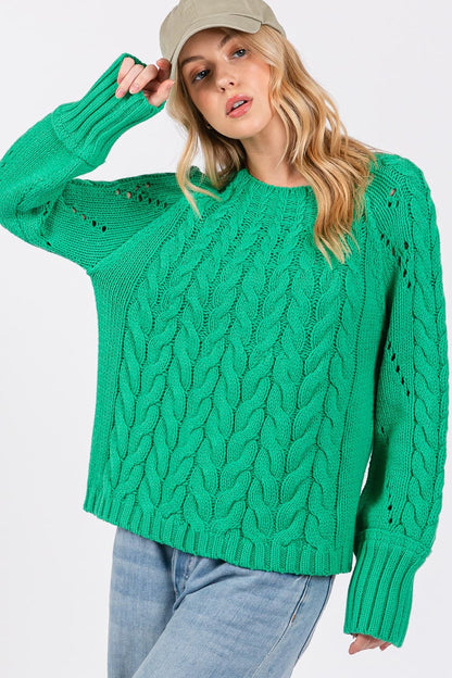 Cozy cable knit oversized sweater with boat neckline