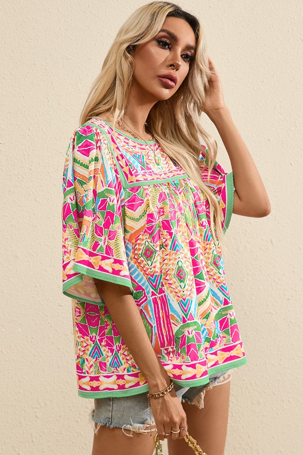 Printed Round Neck Half Sleeve Blouse.