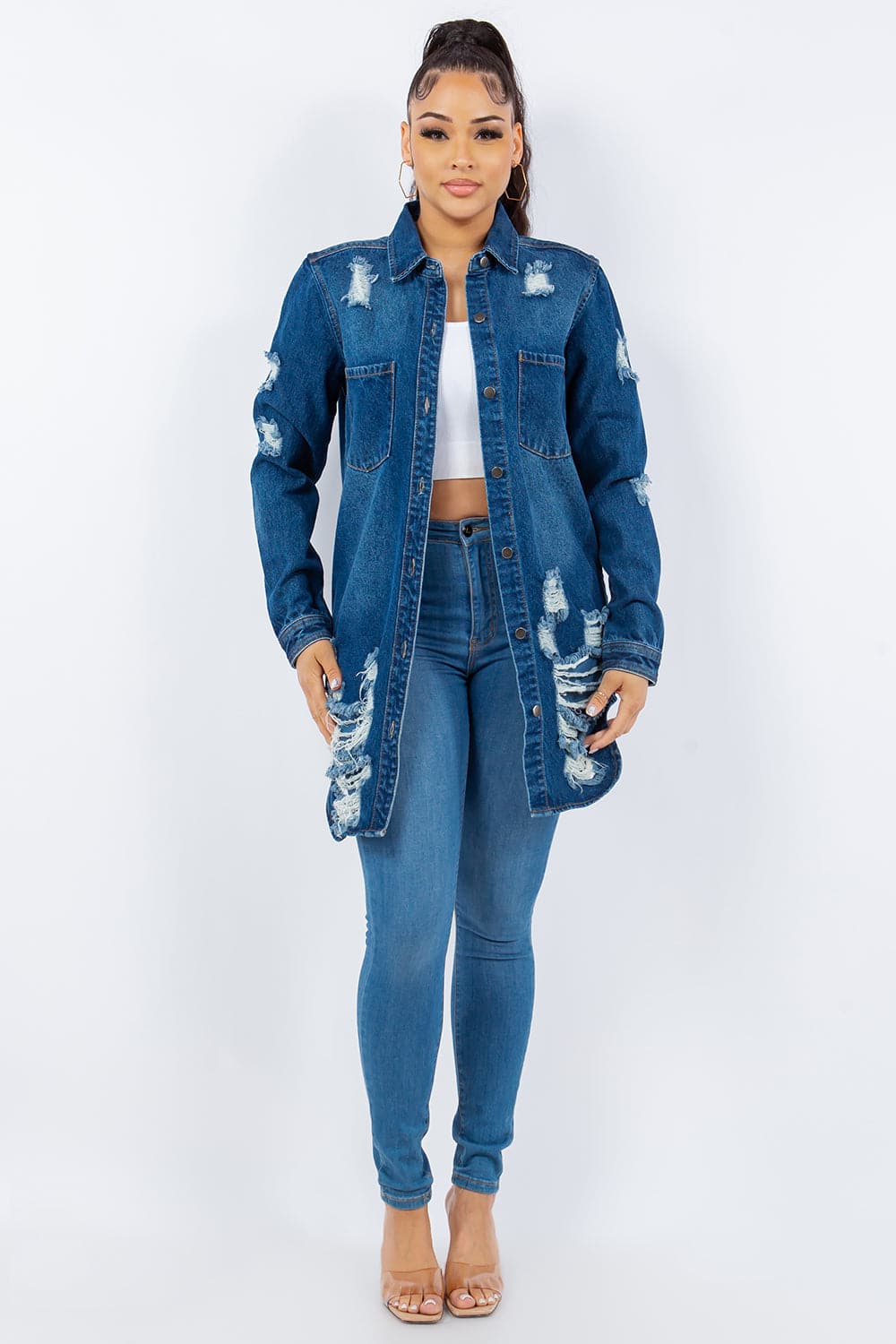 Distressed denim jacket with button-up front and long sleeves