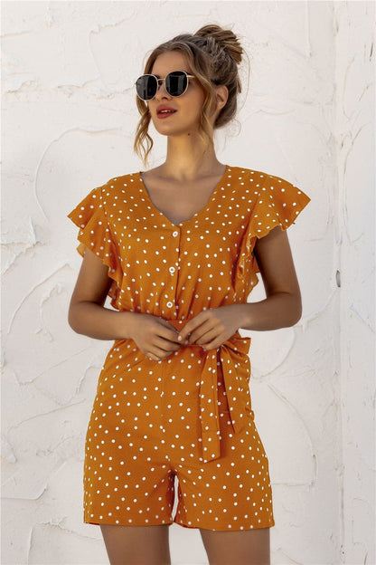 Ruffled Polka Dot Half Button Romper.