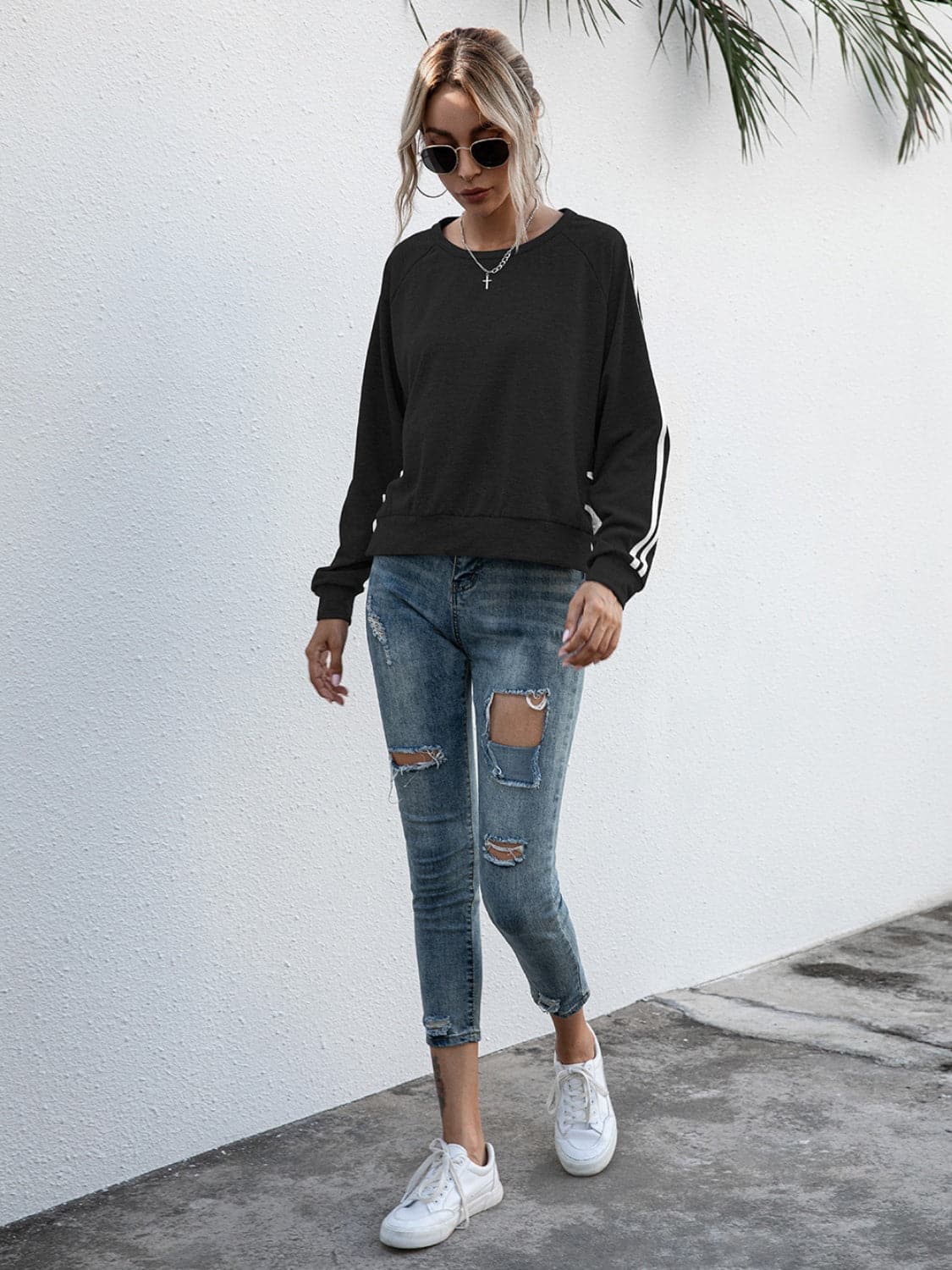 Lace-Up Round Neck Long Sleeve Sweatshirt.