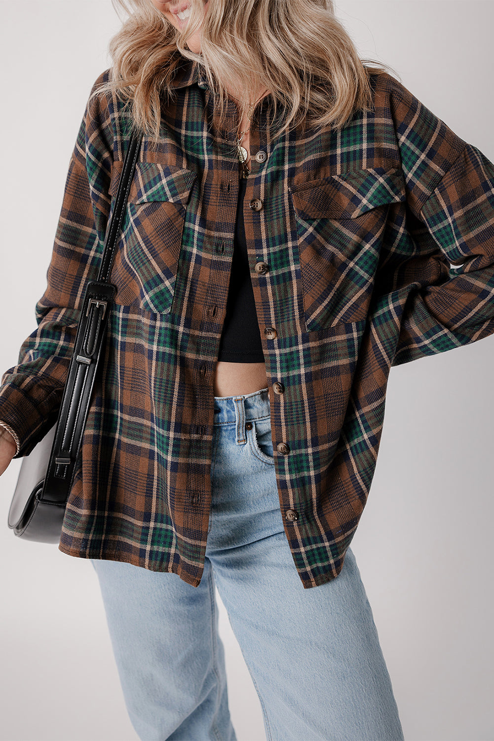 Brown plaid button-up shacket with chest pockets