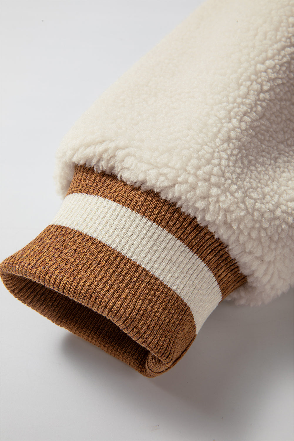 Buckskin corduroy fleece bomber sleeve with varsity stripes and faux shearling.