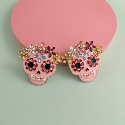 Rhinestone skull earrings in alloy