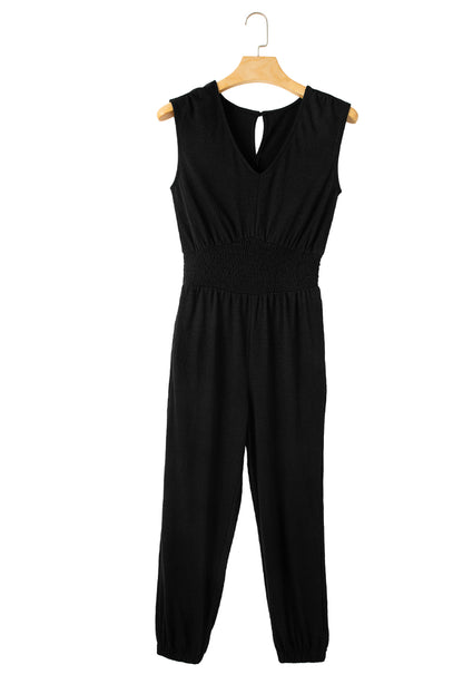 Sleek black sleeveless jumpsuit with v-neck and shirred design