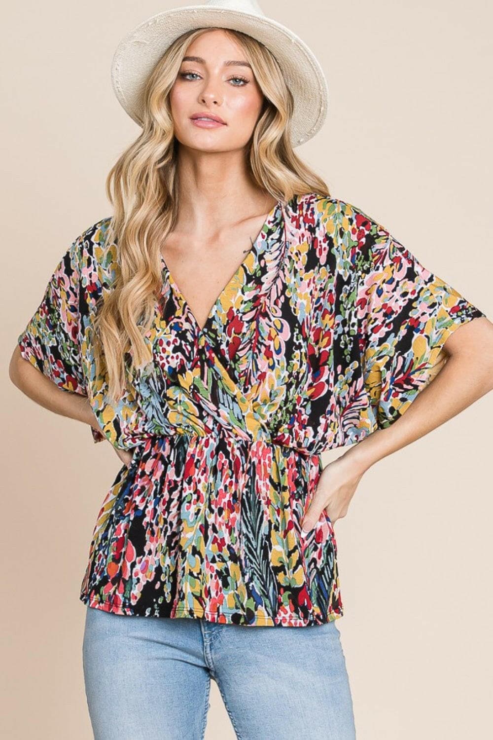 BOMBOM Printed Surplice Peplum Blouse.