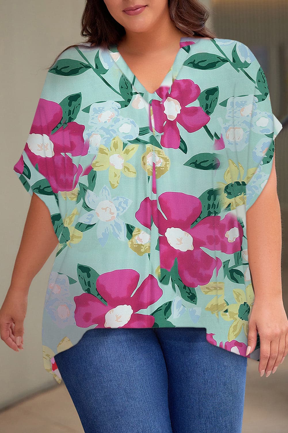 Plus Size Printed Notched Neck Half Sleeve Top.