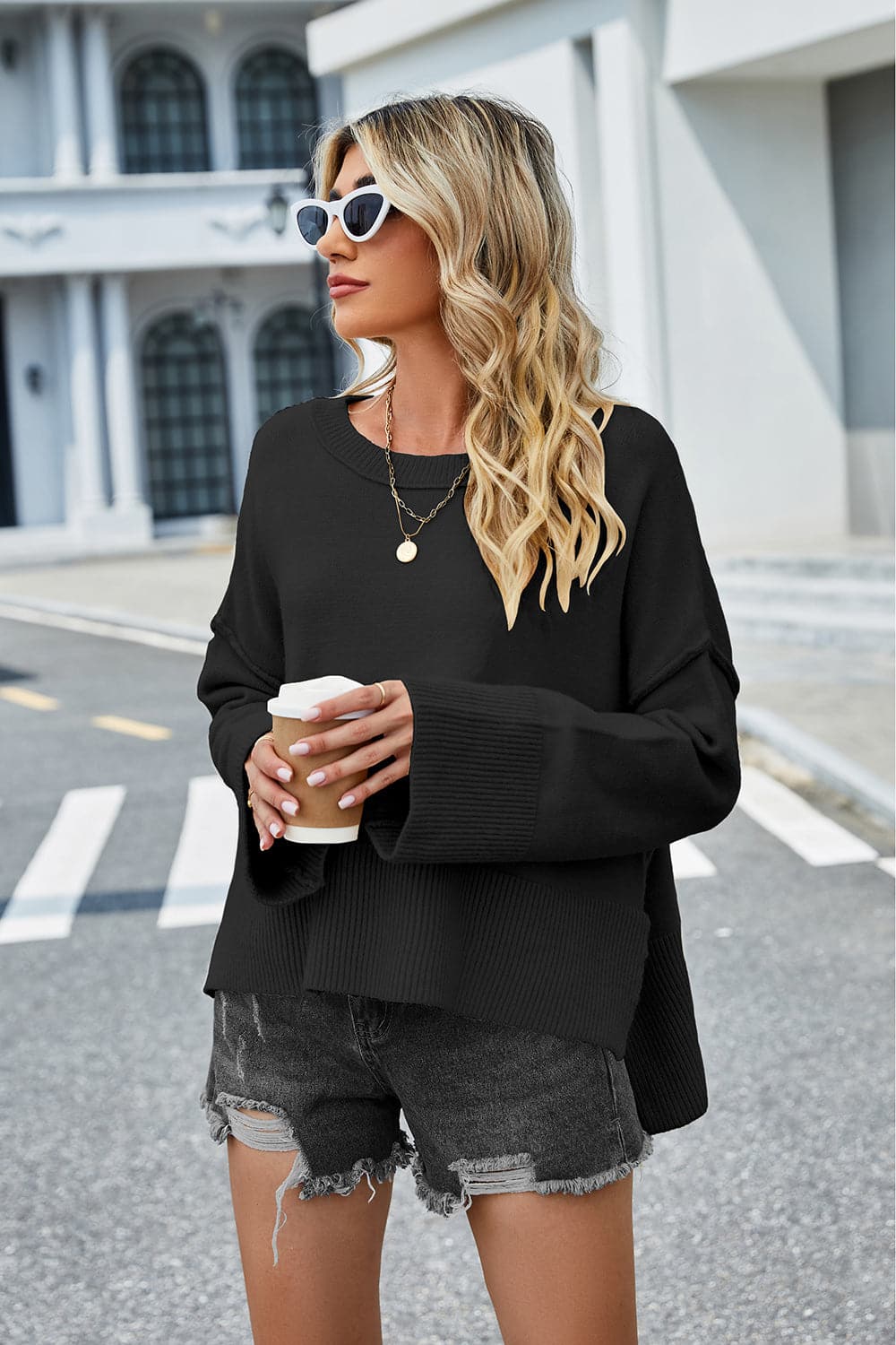 High-Low Slit Round Neck Long Sleeve Sweater.