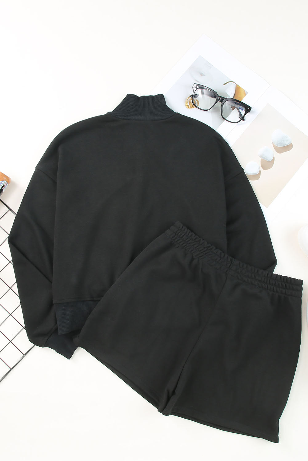 Chic black high neck henley top with matching shorts set