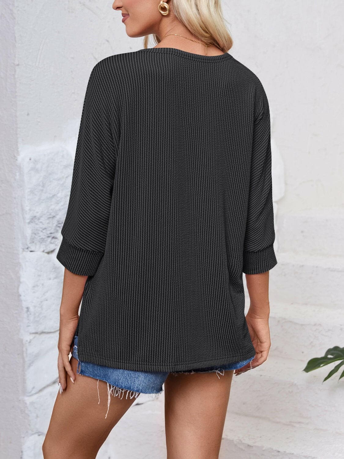 Textured Round Neck Three-Quarter Sleeve Blouse.