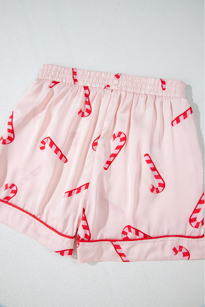 Pink candy cane print holiday pajama set with shirt and shorts