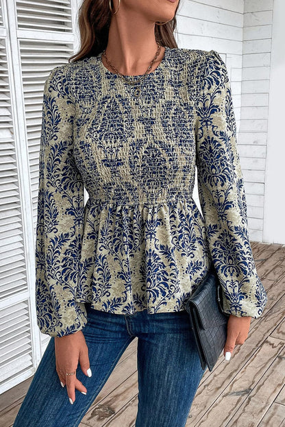 Sheer peplum blouse with print