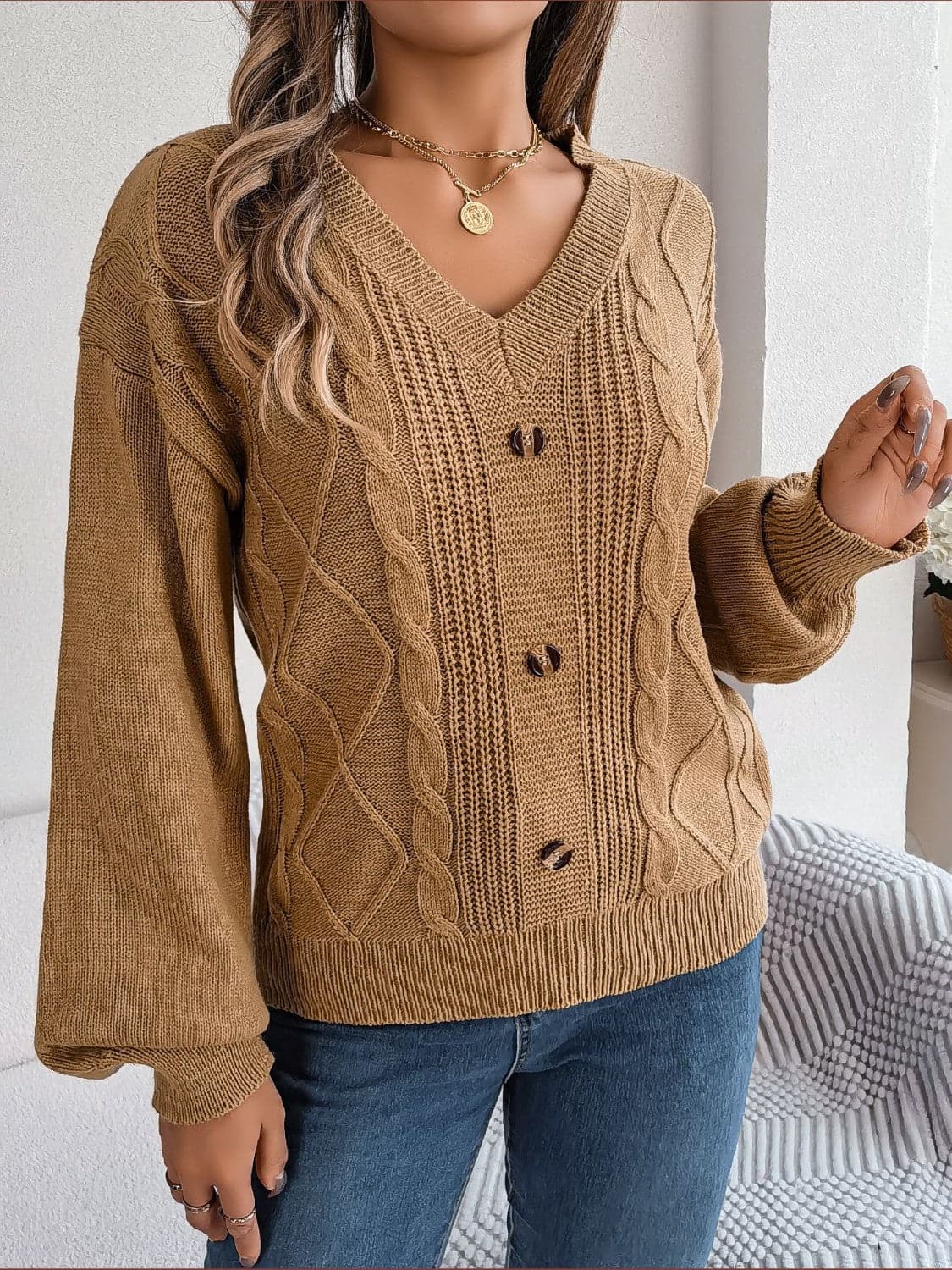 Cable-Knit Buttoned V-Neck Sweater.