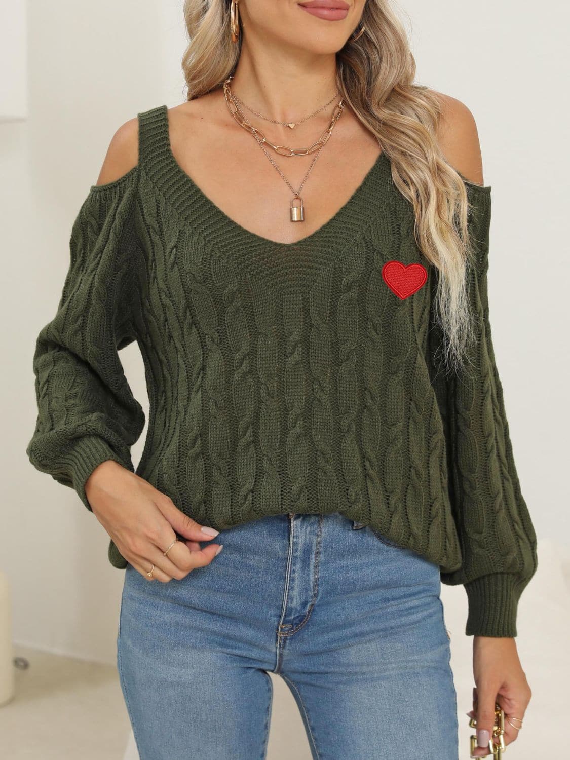 Cozy cable-knit heart v-neck sweater