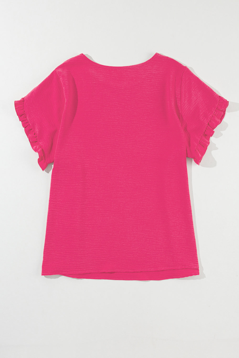 Playful pink ruffled short sleeve top for plus sizes