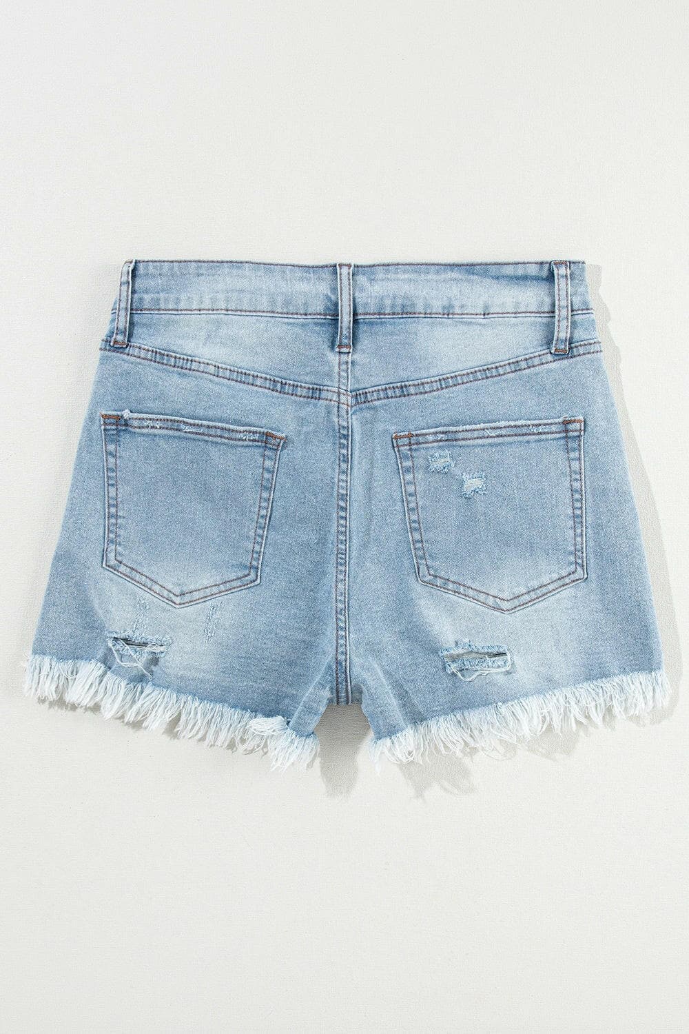 Distressed Raw Hem Denim Shorts.