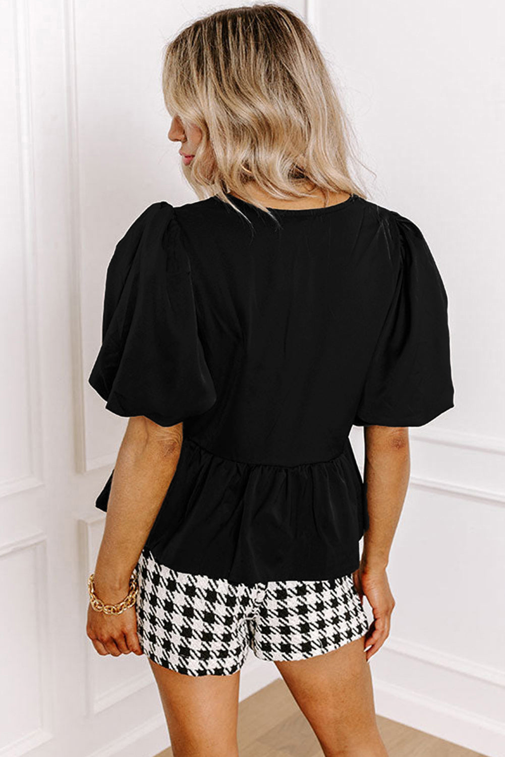 Chic Black Peplum Blouse with Puff Sleeves and Bowknot Detail