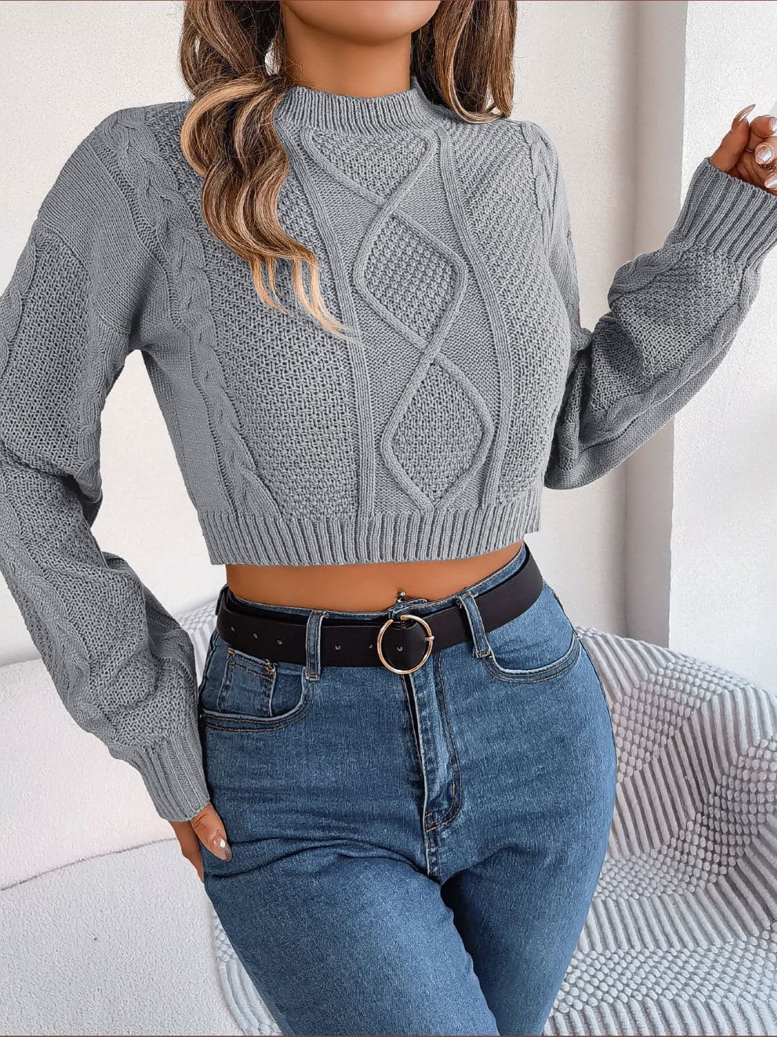 Cable-Knit Round Neck Cropped Sweater.