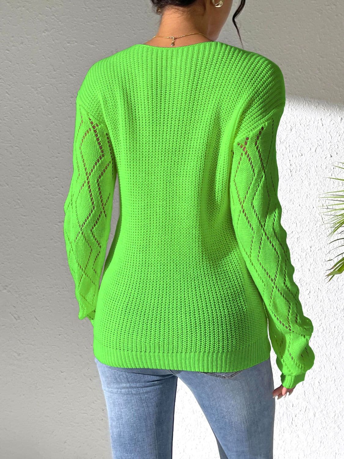 Chic openwork v-neck sweater with long sleeves