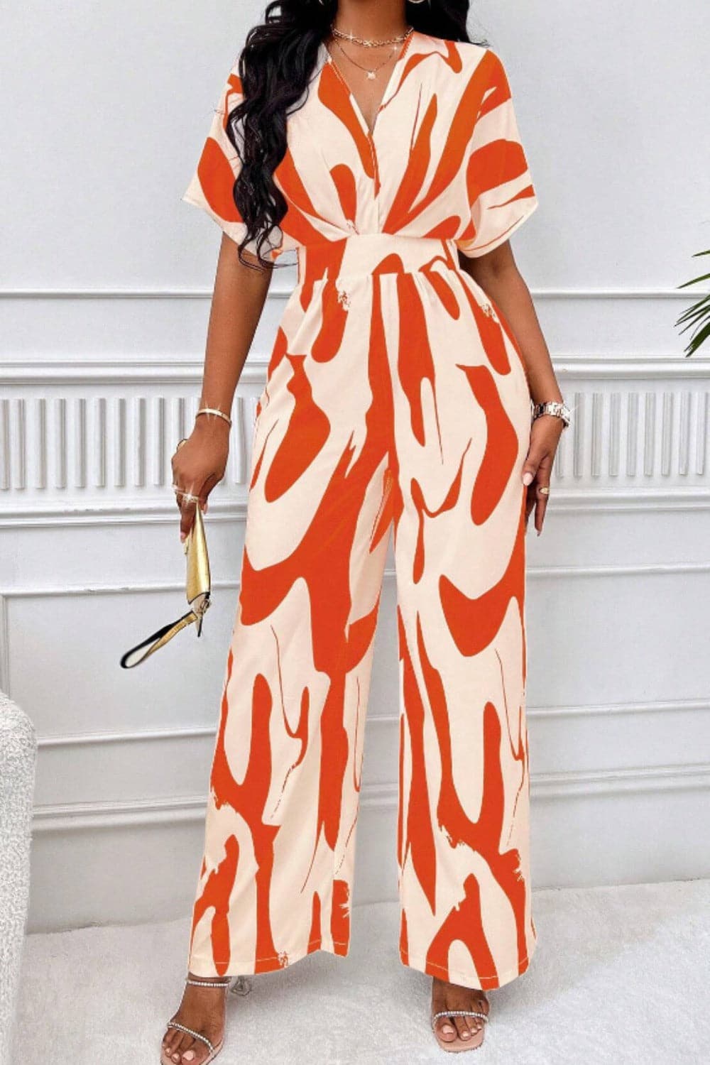 Printed V-Neck Short Sleeve Wide Leg Jumpsuit.