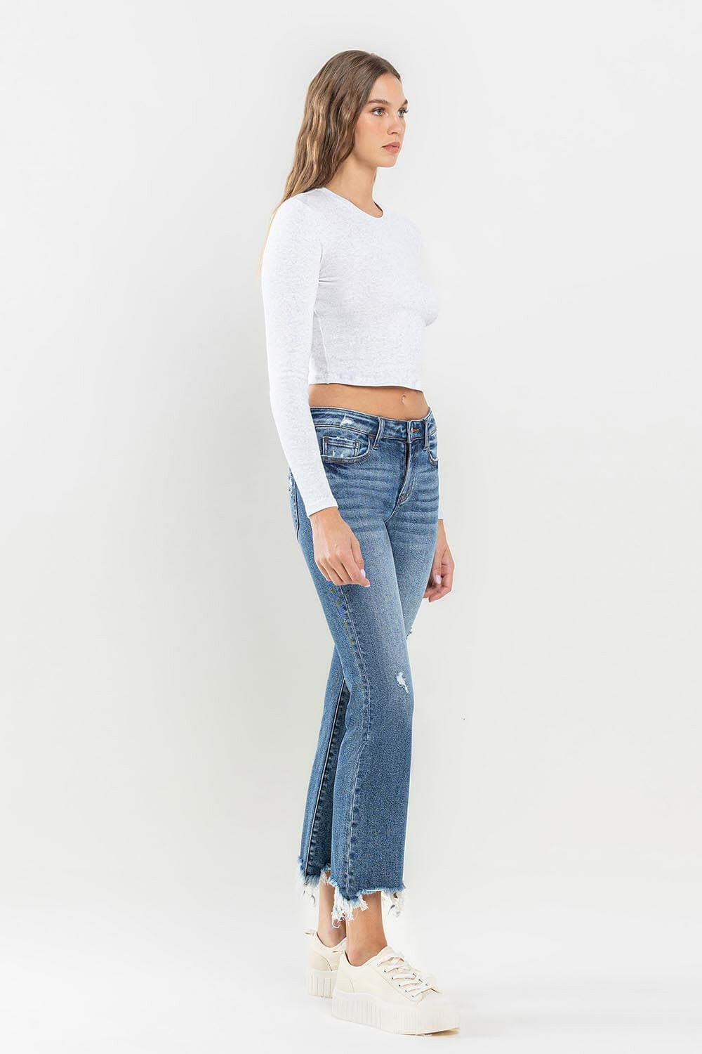 Lovervet Mid Rise Frayed Hem Jeans.