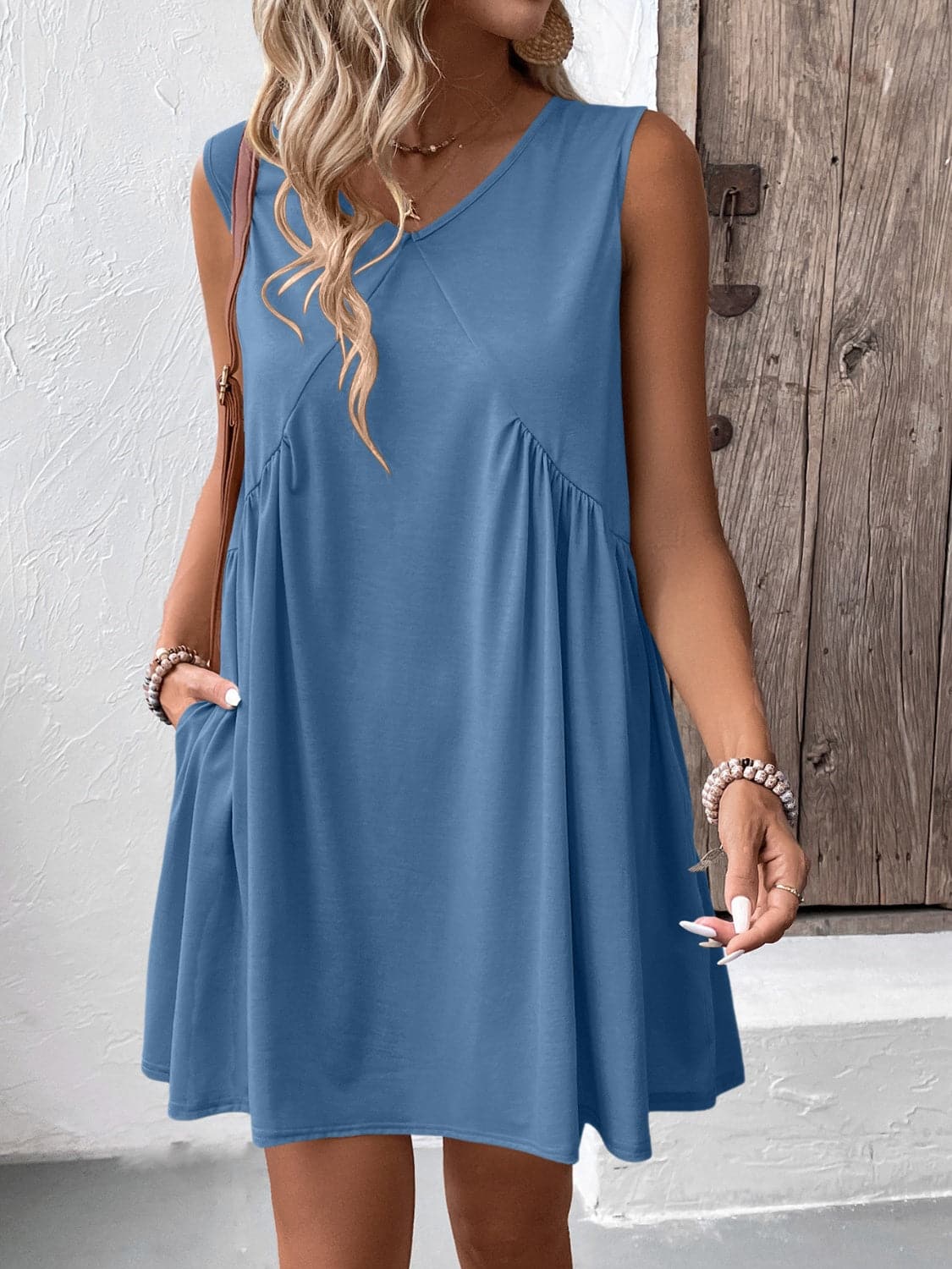 Ruched V-Neck Sleeveless Mini Dress.