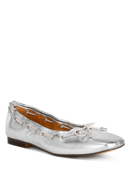 Chic metallic bow detail ballerinas with eyelet accents