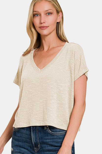 Zenana V-Neck Short Sleeve Crop T-ShirtElevate Your Style with the Zenana V-Neck Short Sleeve Crop T-Shirt
 Experience the perfect blend of comfort and style with the Zenana V-Neck Short Sleeve Crop T-ShiLove Salve -Neck Short Sleeve Cropusa