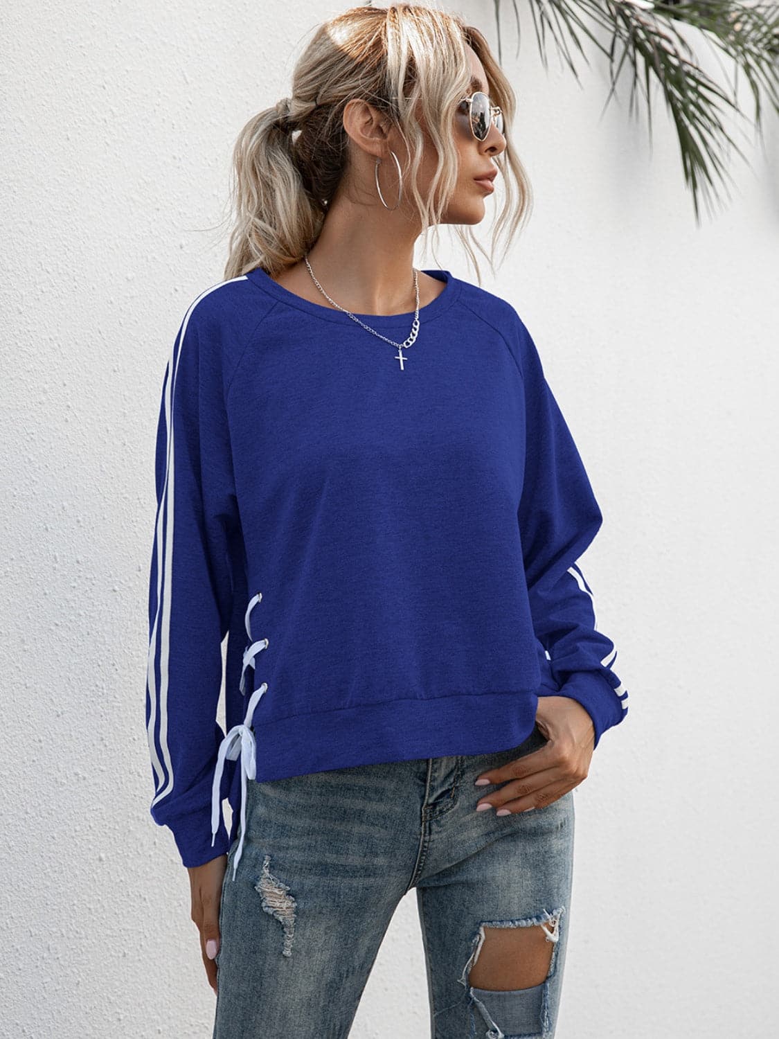 Lace-Up Round Neck Long Sleeve Sweatshirt.