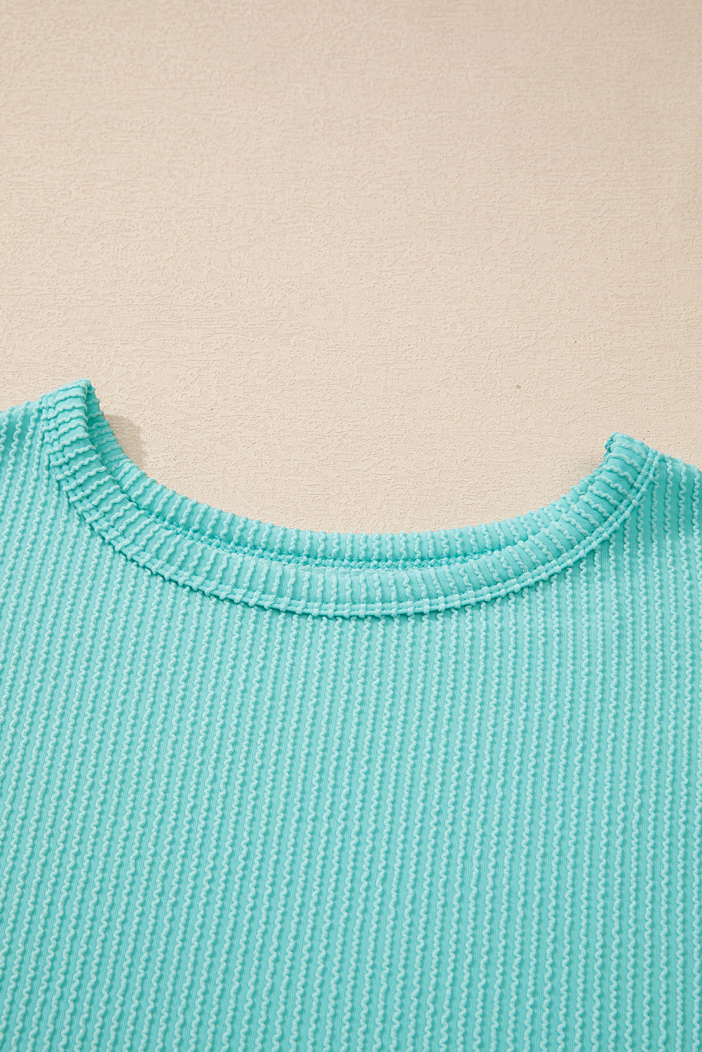 Aruba blue cozy corded knit top with round neck design